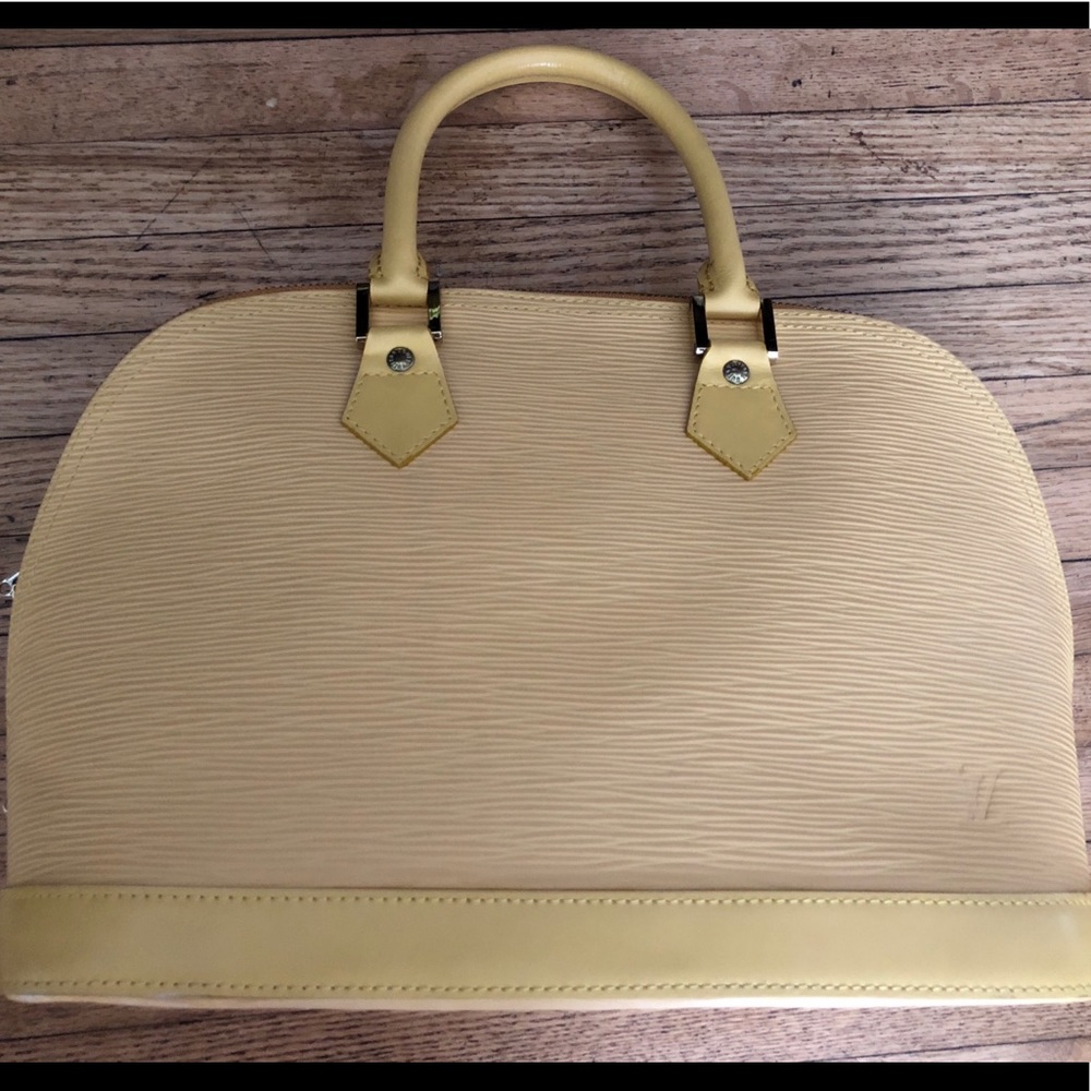 Louis Vuitton Alma PM bag Yellow